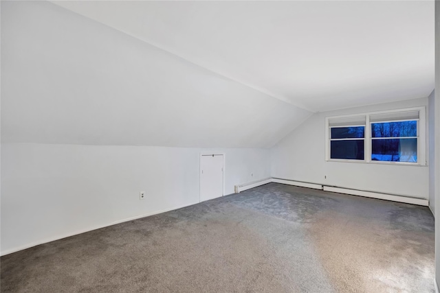 bonus room with carpet flooring, vaulted ceiling, and baseboard heating