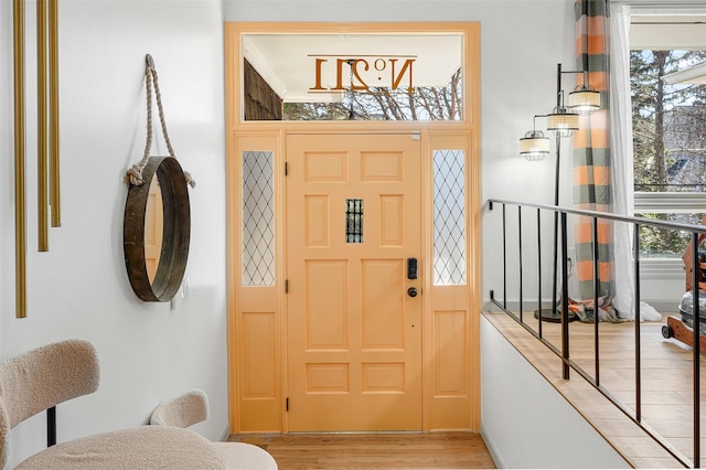 entryway with a healthy amount of sunlight and light wood finished floors