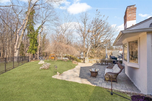 view of yard with a patio and a fenced backyard