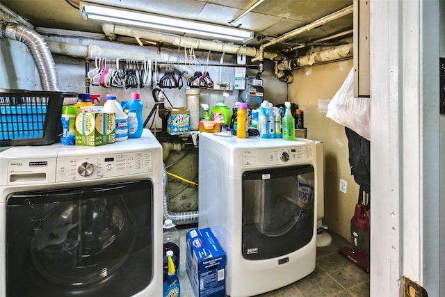 washroom with laundry area and separate washer and dryer