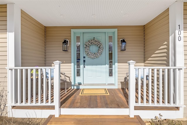 doorway to property with covered porch