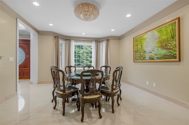 dining area with baseboards, recessed lighting, and crown molding