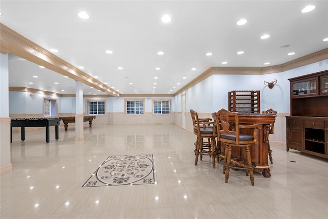 dining area with recessed lighting, billiards, baseboards, a bar, and crown molding