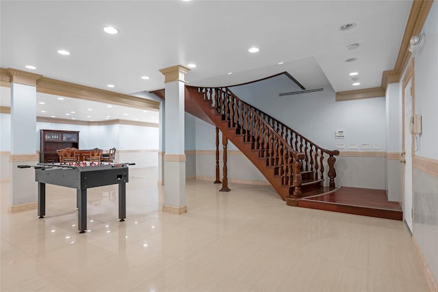 playroom with recessed lighting, wainscoting, and decorative columns