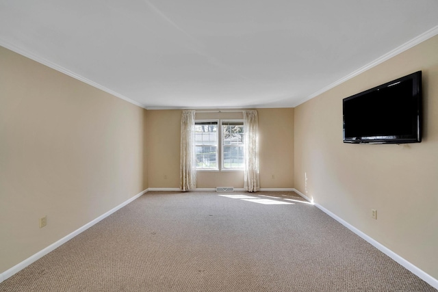 unfurnished room featuring light carpet, crown molding, visible vents, and baseboards