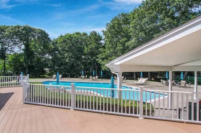 community pool featuring a patio area