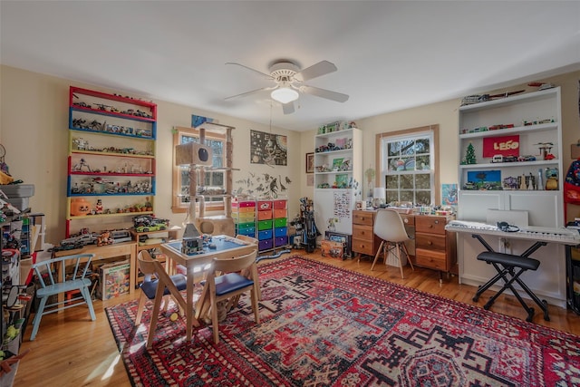 office with ceiling fan and wood finished floors