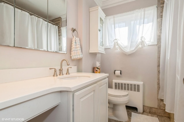 full bathroom with radiator heating unit, a shower with shower curtain, vanity, and toilet