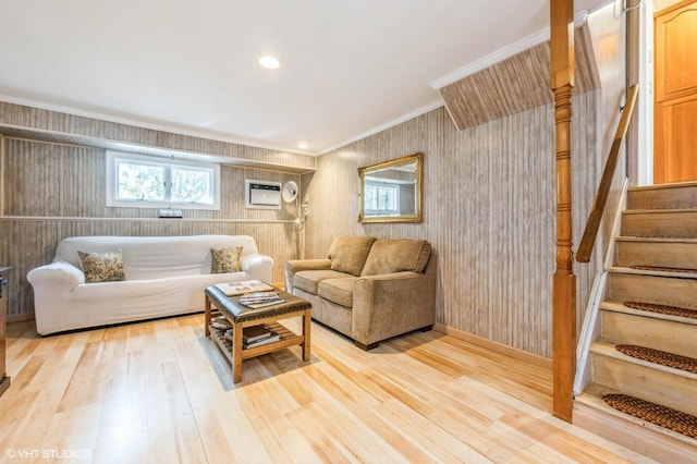 living room with recessed lighting, crown molding, stairway, and light wood finished floors