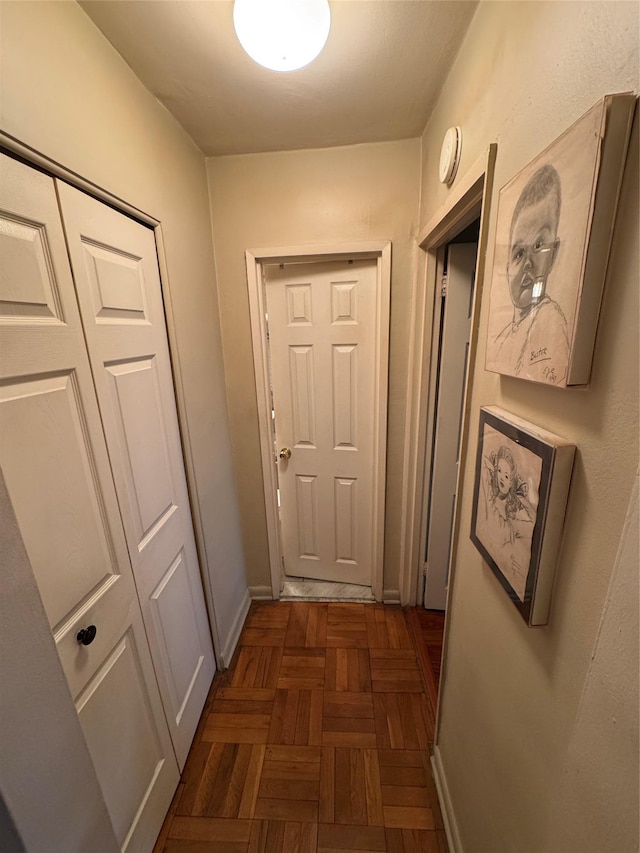 corridor with baseboards