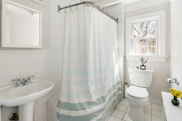 bathroom featuring tile walls, curtained shower, backsplash, toilet, and tile patterned floors