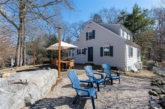 rear view of property with a patio