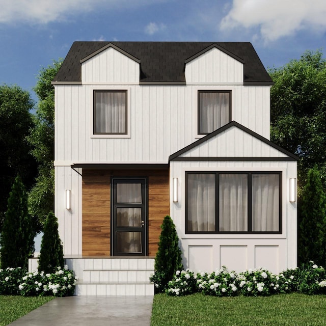 modern farmhouse featuring roof with shingles