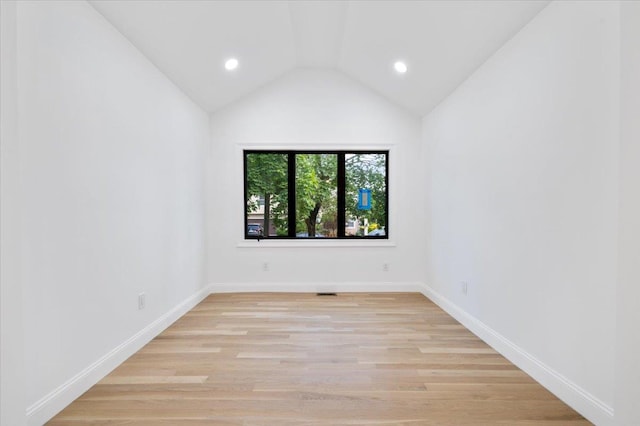 670 Emerson St, Woodmere, NY 11598 - unfurnished room with light wood-type flooring, lofted ceiling, and recessed lighting