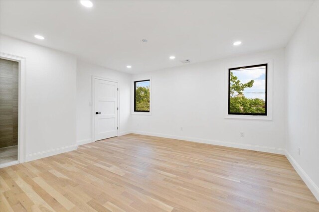 670 Emerson St, Woodmere, NY 11598 - spare room featuring light wood-style floors and recessed lighting