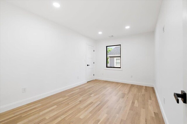 670 Emerson St, Woodmere, NY 11598 - spare room featuring light wood-style flooring and recessed lighting