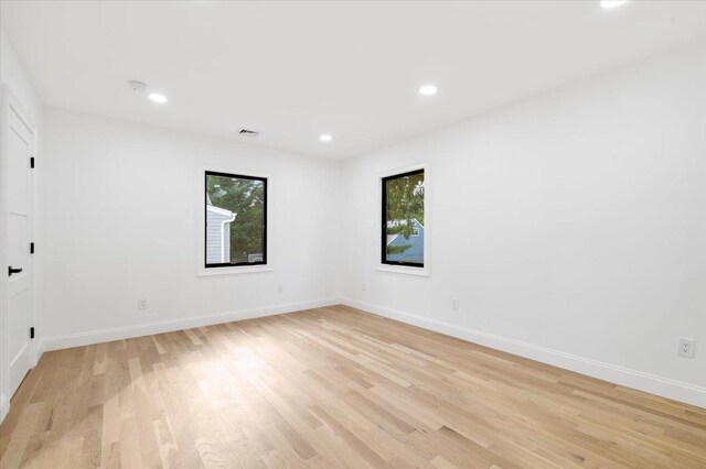 670 Emerson St, Woodmere, NY 11598 - unfurnished room with plenty of natural light, light wood-type flooring, and recessed lighting