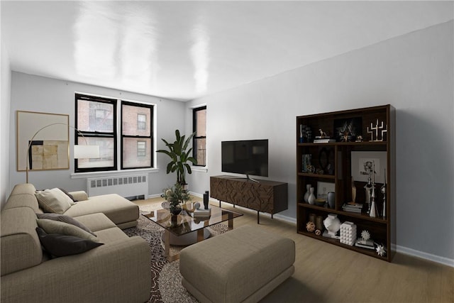 living room featuring baseboards, radiator heating unit, and wood finished floors