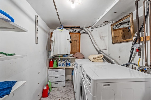 laundry area with marble finish floor and washing machine and clothes dryer