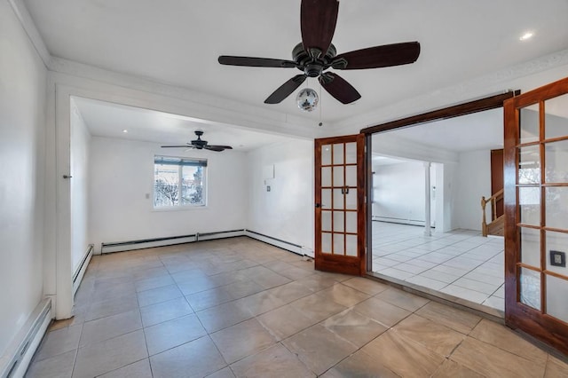 spare room featuring a baseboard heating unit, french doors, baseboard heating, and light tile patterned floors