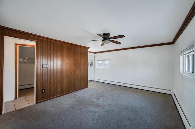 unfurnished bedroom with ornamental molding, a baseboard radiator, and light carpet