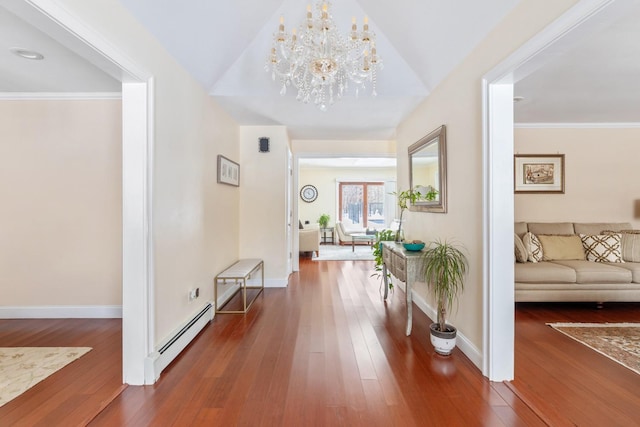 hall with dark wood-type flooring, baseboards, and baseboard heating