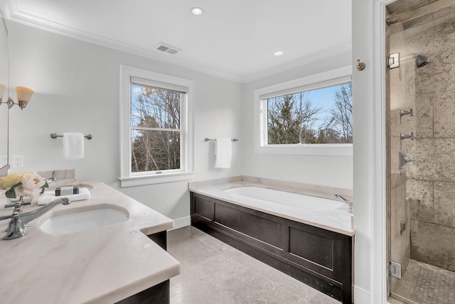 full bathroom with a garden tub, crown molding, visible vents, a shower stall, and vanity