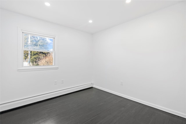 unfurnished room featuring dark wood-type flooring, a baseboard radiator, baseboards, and recessed lighting