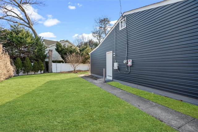 view of yard featuring fence