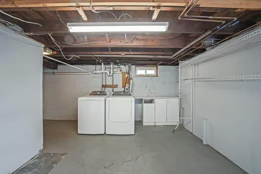 basement with independent washer and dryer