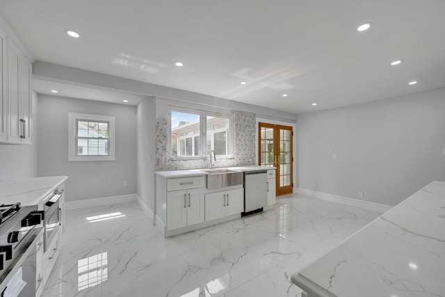 kitchen with recessed lighting, dishwasher, a sink, french doors, and range with gas cooktop