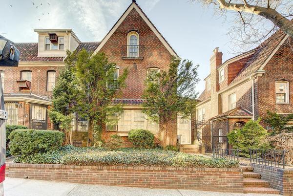 view of front of home with brick siding