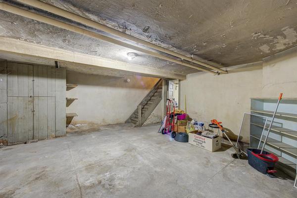 finished basement featuring stairway