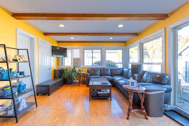 living room with beam ceiling, cooling unit, light wood-style flooring, and recessed lighting