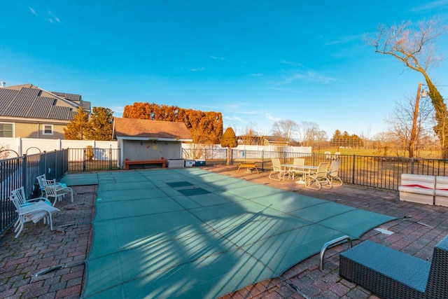 view of pool with a patio area and a fenced backyard