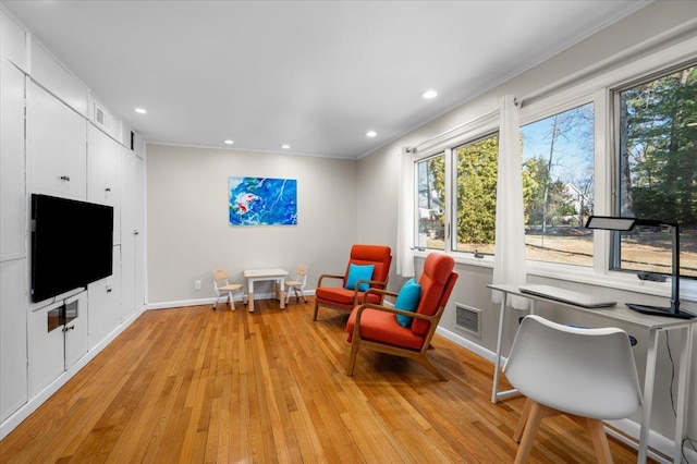 sitting room with recessed lighting, visible vents, baseboards, and light wood-style flooring