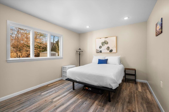 bedroom featuring recessed lighting, baseboards, and wood finished floors