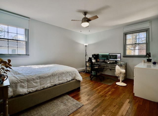 237 Berry Hill Rd, Syosset, NY 11791 - bedroom featuring hardwood / wood-style floors, ceiling fan, baseboards, and multiple windows