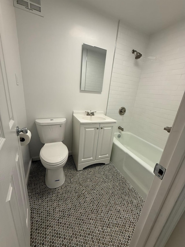 full bathroom featuring visible vents, toilet, shower / tub combination, baseboards, and vanity