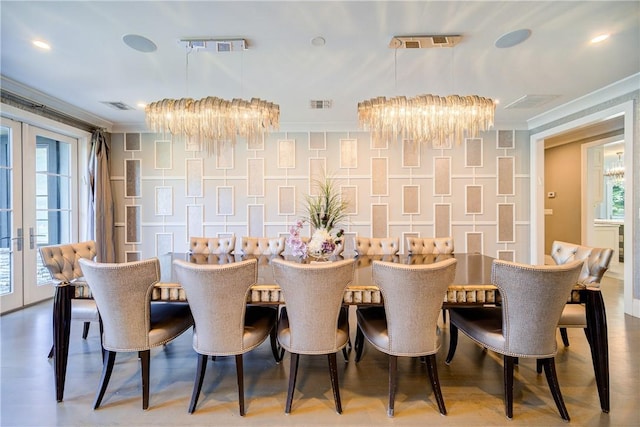 dining room with visible vents, ornamental molding, a notable chandelier, and french doors