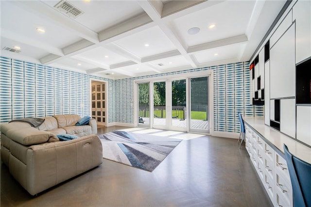 living room with coffered ceiling, visible vents, and wallpapered walls