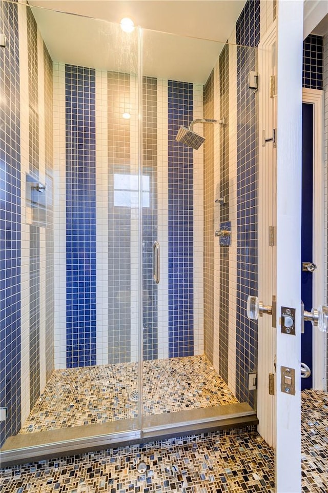 full bathroom with a stall shower