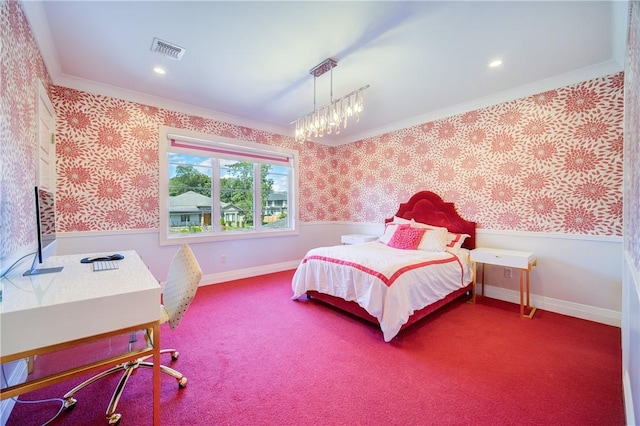 bedroom with carpet flooring, visible vents, baseboards, wainscoting, and wallpapered walls