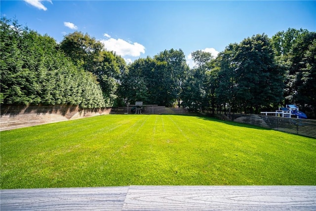 view of yard with fence