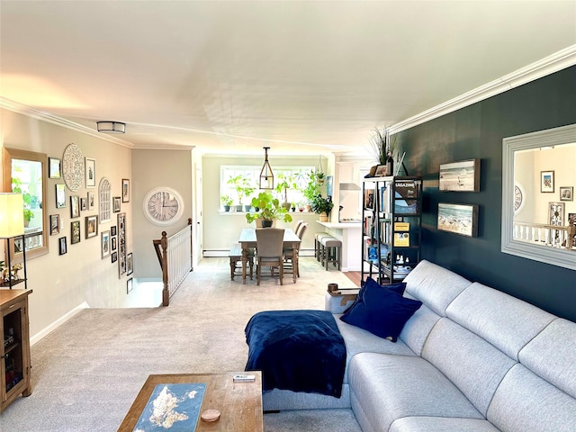 living area with ornamental molding, a baseboard radiator, and carpet floors