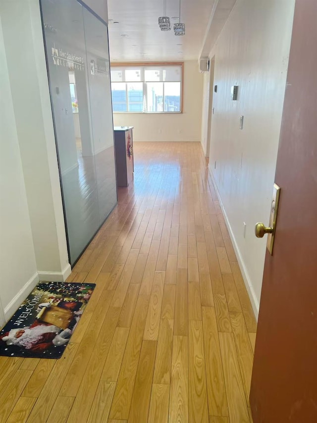 hall featuring light wood-type flooring