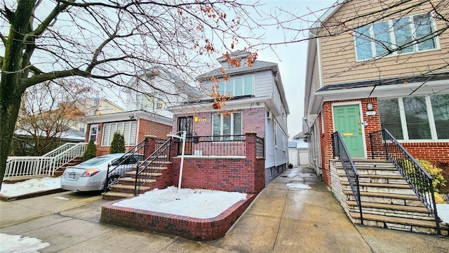 view of front of home with brick siding