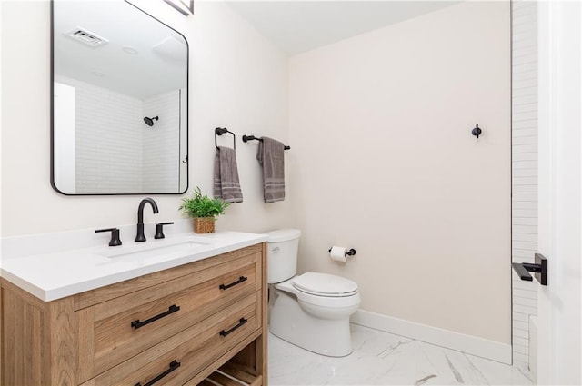 bathroom featuring baseboards, visible vents, toilet, marble finish floor, and vanity