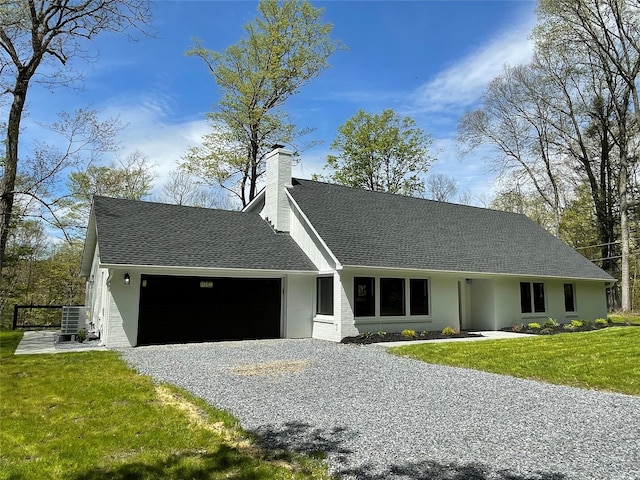 16 Shunpike, Clinton Corners, NY 12514 - view of front of house with a garage, driveway, a chimney, roof with shingles, and a front lawn