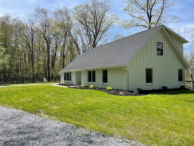 16 Shunpike, Clinton Corners, NY 12514 - view of home's exterior featuring board and batten siding, roof with shingles, a chimney, and brick siding
